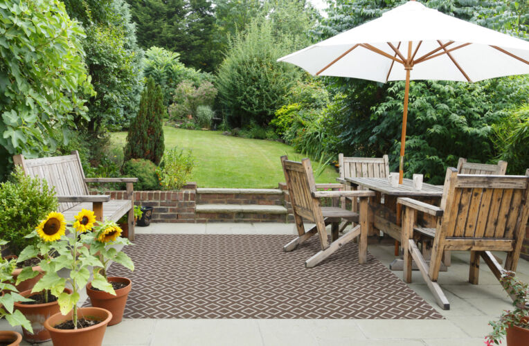 Foss Floors area rug being used in outside garden patio